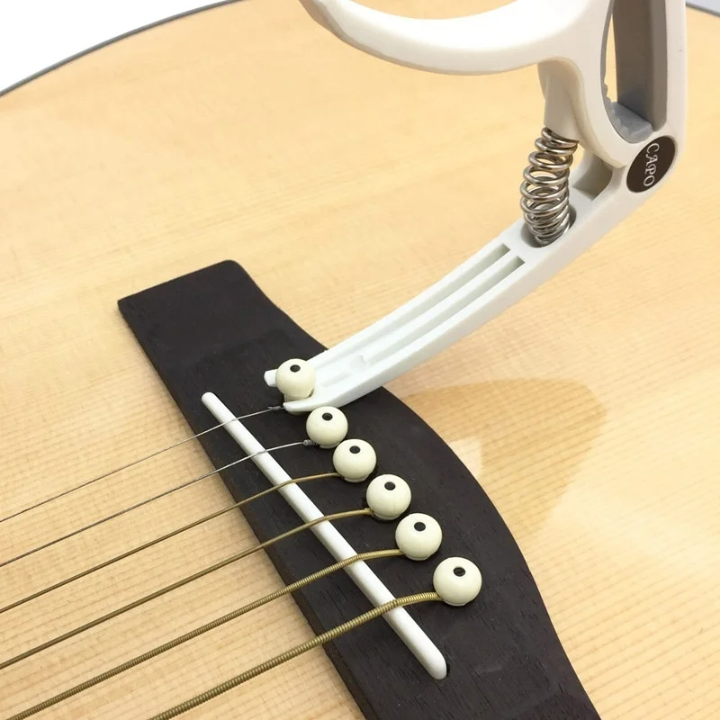 Plastic Guitar Capo for 6 Stri - đánh giá và giá Guitar Capo Clip